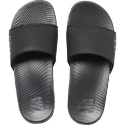 Reef Womens One Slider Flip Flops -Deep Wetsuit 42687 202320Reef20Womens20One20Slide20Flip20Flop20CJ017420 20Black20Top.2000x2000