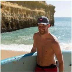 Red Paddle Co. Original Paddle Cap 7 Red Paddle Co. Original Paddle Cap -Deep Wetsuit red original paddle cap male paddling grande cropped.2000x2000